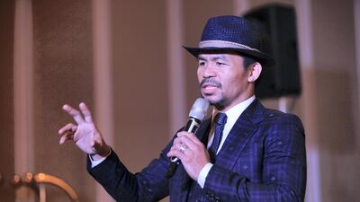 Dressed in a navy-patterned three-piece suit, navy tie and crisp white shirt, the senator has furnished his outfit with a matching trilby with brown trim. Certainly, a Filipino Frank Sinatra could carry a tune. Jake Verzosa for The National