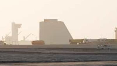 Construction of a temporary structure that will test how light falls in the atrium of the Louvre continues on Saadiyat Island. A reader applauds the decision to delay the award of the final construction contract.