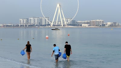 Volunteers cleared both the sand and sea. Satish Kumar / The National