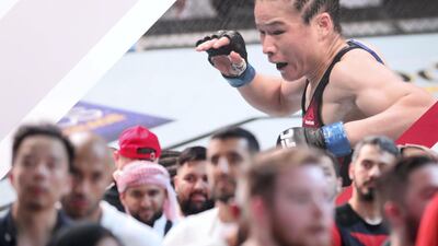 People gather at the UFC fan zone. Yas Island, Abu Dhabi. Chris Whiteoak / The National
