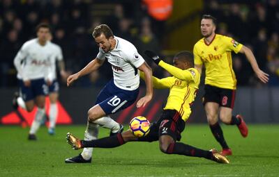 Tottenham Hotspur's Harry Kane and Watford's Christian Kabasele. Daniel Hambury / PA