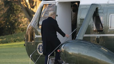 US President Donald Trump boards Marine One on his way to Florida for the holiday, before he released another list of pardons. Bloomberg