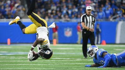Pittsburgh Steelers wide receiver Antonio Brown flips over Detroit Lions cornerback Quandre Diggs during the third quarter at Ford Field. Tim Fuller / USA TODAY Sports