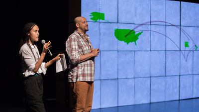 Kenaza Schaal and Christopher Myers, the creators of 'Cartography', in front of the map in its early stages Nikith Nath / NYUAD