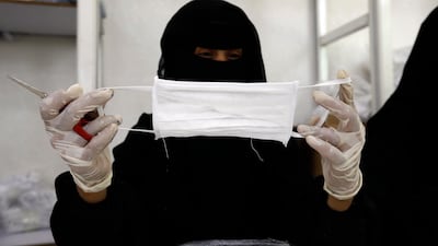 More than 160 Yemeni women work in a revitalised textile factory in Sanaa to make nearly 15,000 protective face masks per day amid a severe shortage of surgical masks. EPA