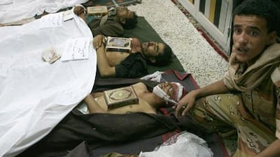 A soldier from a dissident military troop grieves for a comrade, one of several people killed during clashes with those loyal to President Ali Abdullah Saleh which broke out at dawn and raged into the morning in the Yemeni capital, Sanaa. Mohammed Huwaid / AFP Photo