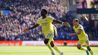 Arsenal's Bukayo Saka celebrates scoring. PA