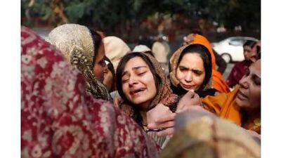 Relatives of the slain Indian policeman, Subhash Tomar, grieve in Delhi. Tomar was killed in riots after a high-profile rape case in the capital. A reader regrets the toll of the violence on both sides. Mustafa Quraishi / AP