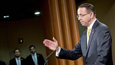 Rod Rosenstein, deputy attorney general, announces the indictment of 13 Russians including a man dubbed 'Putin's chef'. Photographer: Andrew Harrer/Bloomberg