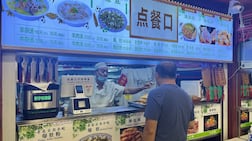 Halal food restaurants in Niujie serve a meat-heavy menu ranging from beef and lamb offal soups and boiled tripe to sausage-wrapped meat, lamb skewers and beef pies. Saeed Saeed / The National