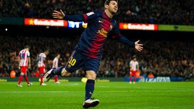 Barcelona's Lionel Messi celebrates scoring against Atletico Madrid.
