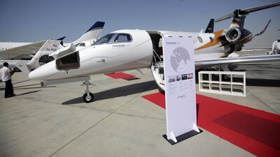 An Embraer Phenom 300 on display at the Abu Dhabi Air Expo. Business jet sales are expected to rebound. Sammy Dallal / The National