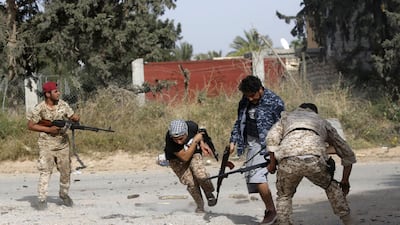 Libyan fighters loyal to the Government of National Accord fire at forces loyal to Khalifa Haftar south of Tripoli's, on April 20, 2019. AFP