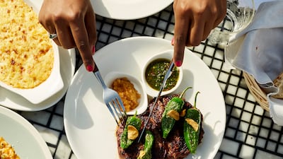 Rib-eye steak with padron peppers. Photo: Carine