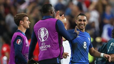 France’s Dimitri Payet celebrates with teammates at the end of the match. Lee Smith / Reuters