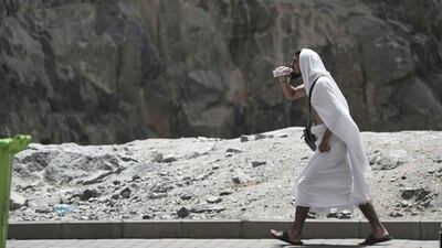 A pilgrim on his way to the Grand Mosque in Makkah. AP