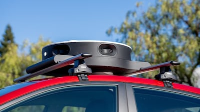 A camera system to collect data and advance self-driving car technology developed by Toyota's subsidiary Woven Planet is seen atop an autonomous test vehicle in San Francisco, US. Reuters