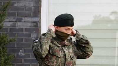 Leader of South Korean K-pop boyband Big Bang G-Dragon leaves after being discharged from army in Yongin, South Korea, October 26, 2019. REUTERS/Heo Ran