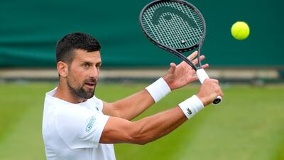 Novak Djokovic practices on Court 2 at the All England Lawn Tennis and Croquet Club in Wimbledon. AP