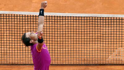 Spain's Rafael Nadal celebrates after beating Albert Ramos Vinolas to win the Monte-Carlo Masters Series Tournament on April 23, 2017 in Monaco. Valery Hache / AFP