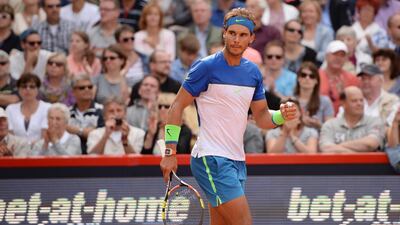 Spain’s Rafael Nadal celebrates his win in the semi-finals against Andreas Seppi of Italy at the ATP Hamburg Open on Saturday, setting up a battle for the title against new nemesis Fabio Fognini. Daniel Reinhardt / AP Photo