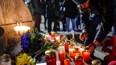 Mourners at a vigil for the victims of a racist shooting in Hanau, Germany, in 2020. EPA