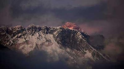 Mount Everest in the Himalaya's Khumbu region, Nepal. Mountaineering Department official Gyanendra Shrestha said Monday, May 21, 2012, that a German, a Nepal-born Canadian and a Korean died Saturday while descending from the 8,850-metre (29,035-foot) summit. (AP Photo/Kevin Frayer, File)