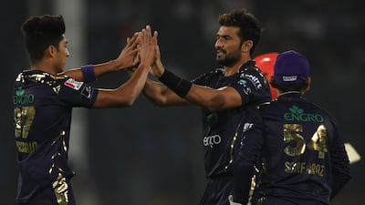 Quetta Gladiators' Sohail Khan celebrates with team mate Mohammad Hasnain after the dismissal of Islamabad United's Amad Butt. AFP