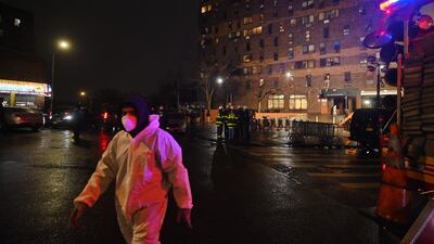 A worker at the scene in the Bronx. AFP