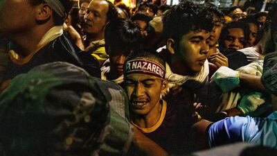 The Black Nazarene is a dark wood sculpture of Jesus brought to the Philippines in 1606 from Spain and considered miraculous by Filipino devotees. Getty