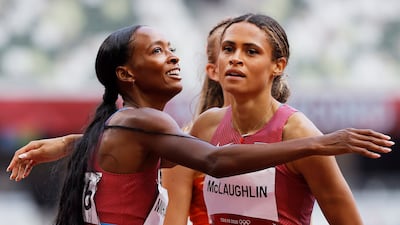 Winner Sydney McLaughlin, right, of the US and second-placed Dalilah Muhammad of the US after the Women's 400m Hurdles final.