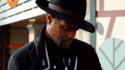 Look 2: Accessorise a hat with a graphic print scarf or rings. Photo: Andrea Menin