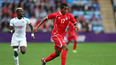Mohamed Fawzi of UAE dribbles the ball against Senegal at City of Coventry Stadium in Coventry, England. Getty Images