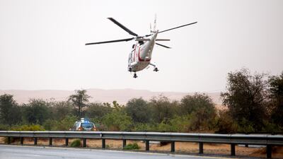 Emergency crews evacuate a motorist by helicopter after a vehicle went off the road in Dubai. Christopher Pike / The National