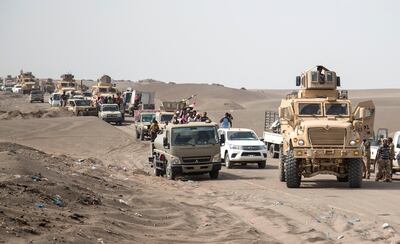 Fighters from the Tihama Resistance and Tareq Saleh's forces travel along the Hodeidah coast on May 29, 2018. Asmaa Waguih for The National