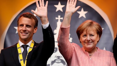 French President Emmanuel Macron and German Chancellor Angela Merkel call for a united Europe to tackle foreign policy issues at a ceremony in Aachen, Germany, 10 May 2018. EPA/RONALD WITTEK