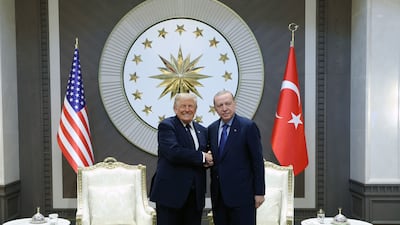 Turkish President Recep Tayyip Erdogan shakes hands with his US counterpart Donald Trump in Ankara, where the Nato summit is being held. AFP