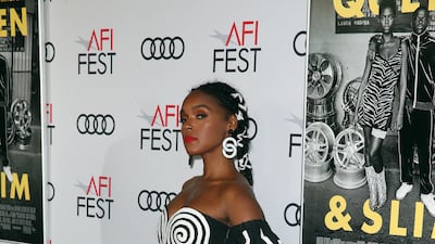 Janelle Monae, wearing a black and white Mara Hoffman two-piece, arrives at the Queen & Slim premiere on November 14, 2019. EPA