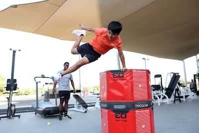 Ayaan trains with coach Ceejay Bollo to build endurance and strength. Chris Whiteoak / The National