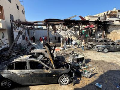 Paramedics at the site of the Israeli strike on the Palestinian camp. Reuters