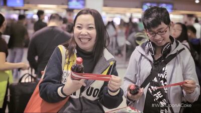 A YouTube still from the new Wish Upon a Coke campaign carried out at the Dubai International Airport. Courtesy Coca-Cola