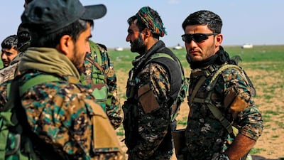 Members of the Syrian Democratic Forces. The US backed group is dominated by the Kurdish YPG militia, which stands to lose significantly if a proposed safe zone in northeast Syria under negotiations between Washington and Ankara is realised . AFP