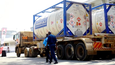 Tanker trucks delivering crude oil in Kenya. Reuters