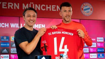 Ivan Perisic poses with his new club shirt alongside Bayern Munich manager Niko Kovac. AFP