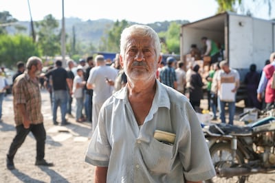 Mohammed Awana lost his olive and pomegranate trees in the wildfires in Latakia, north-west Syria. Ahmad Fallaha for The National