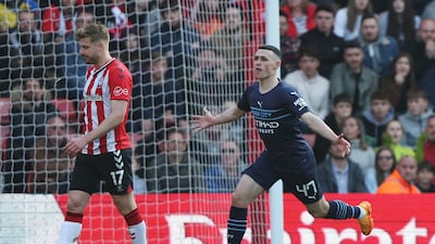 Phil Foden celebrates scoring City's third goal. Reuters