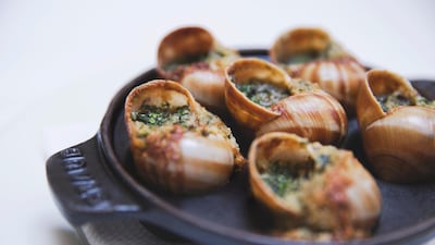 Snails with garlic butter. Courtesy La Petite Maison