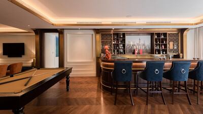 The entertainment room's bar and pool table. Courtesy Luxhabitat Sotheby's International Realty