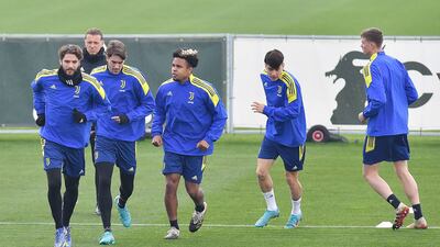 Manuel Locatelli, Dusan Vlahovic and Weston McKennie train in Turin for the Champions League game against Villareal. EPA