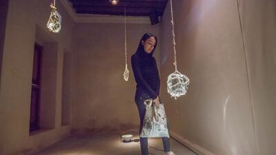 A visitor looking at an art installation at Sharjapan 2019. Leslie Pableo / The National